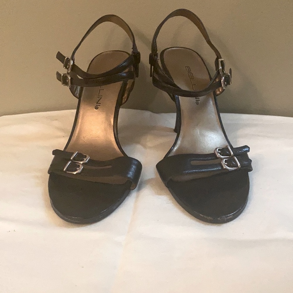 Black strappy heels, gently loved.